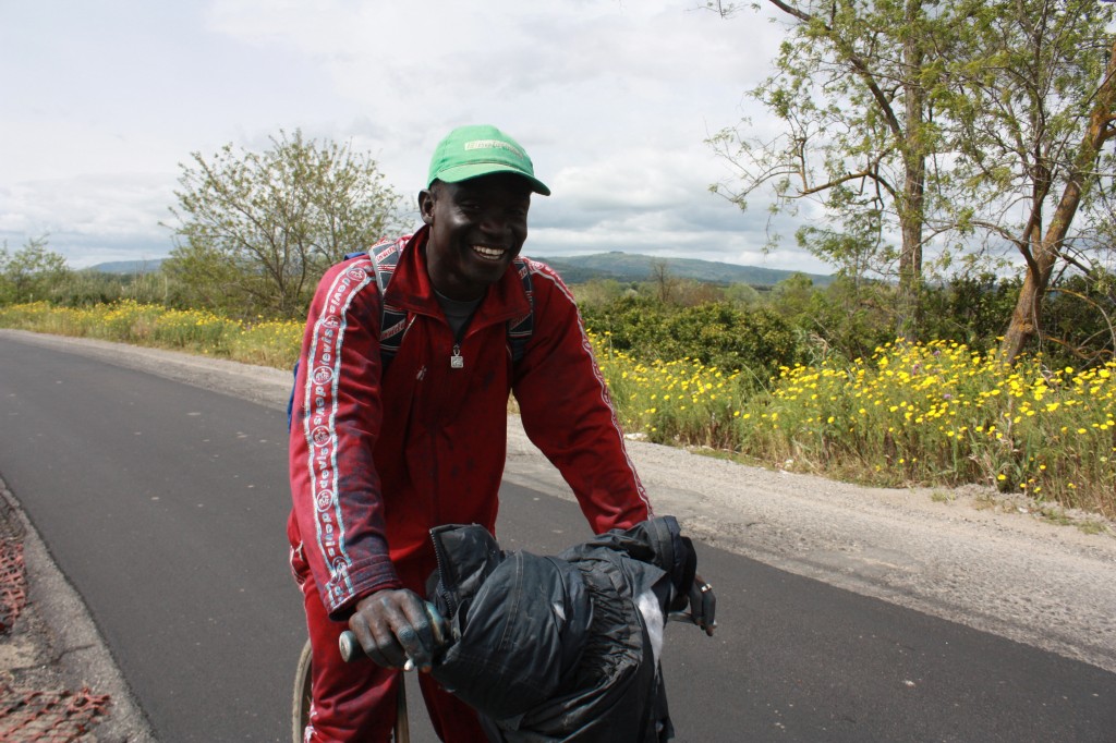 Moussa migrant on his bike